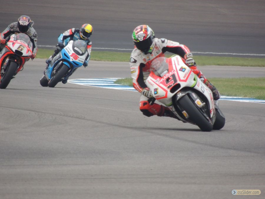 9 Danilo Petrucci, background 6 Bradl, 15 De Angelis